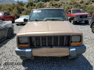 1999 Jeep Cherokee Sport z VIN 1J4FF68S7XL553295, wystawiony jako Copart lot #62390915 z przebiegiem 358 587 mil mil oraz Czysty tytuł • Clean title. Historia ofert i sprzedaży dostępna na DreamBid. Obrazek 5.