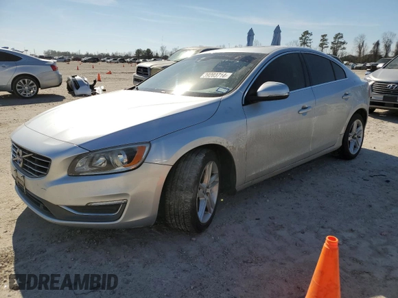 2015 Volvo S60 T5 Drive-E Premier with VIN YV140MFK7F2355479, listed as a Copart auction lot 39203714 with 106,920 mi miles. Bid and sale history available at carsss.com. Image 1.
