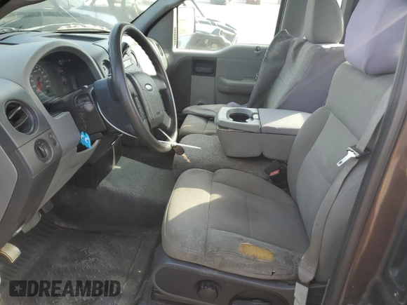2006 Ford F-150 STX with VIN 1FTRF02286KC76752, listed as a Copart auction lot 76233404 with 135,093 mi miles and Salvage Title. Bid and sale history available at carsss.com. Image 7.
