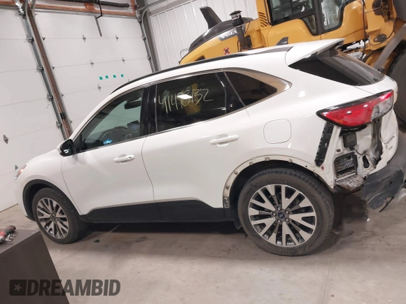 2021 Ford Escape Titanium Hybrid с VIN 1FMCU9DZXMUB03855, выставлен на аукционе IAAI как лот 41498132 с пробегом 63 892 миль миль и . История ставок и продаж доступна на DreamBid. Изображение 14.