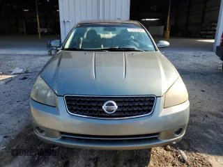 2006 Nissan Altima 3.5 SE with VIN 1N4BL11D66C145693, listed as a Copart auction lot 73765084 with 87,882 mi miles and Salvage Title. Bid and sale history available at carsss.com. Image 5.