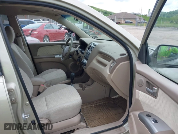 2008 Kia Sportage LX with VIN KNDJE723687485284, listed as a IAAI auction lot 42207326 with 94,106 mi miles and . Bid and sale history available at carsss.com. Image 5.
