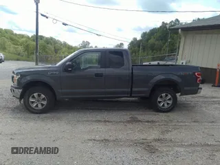 2020 Ford F-150 XL with VIN 1FTFX1E58LFB70690, listed as a IAAI auction lot 42131900 with 168,571 mi miles and . Bid and sale history available at DreamBid. Image 14.