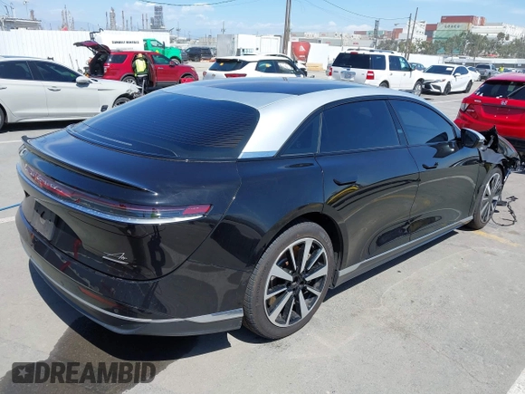 2023 Lucid Air Grand Touring z VIN 50EA1GBA0PA004565, wystawiony jako IAAI lot #41913843 z przebiegiem 25 468 mil mil oraz . Historia ofert i sprzedaży dostępna na DreamBid. Obrazek 4.