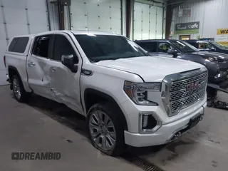 2021 GMC Sierra 1500 Denali with VIN 3GTU9FET5MG113845, listed as a IAAI auction lot 42307779 with 82,584 mi miles and . Bid and sale history available at DreamBid. Image 1.
