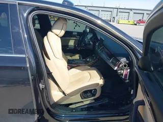 2011 Audi A8 with VIN WAUAVAFD5BN022388, listed as a IAAI auction lot 42102765 with 141,865 mi miles and . Bid and sale history available at DreamBid. Image 5.