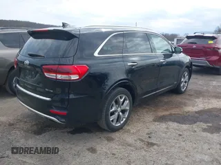 2016 Kia Sorento SX with VIN 5XYPKDA51GG073912, listed as a IAAI auction lot 42020501 with 172,836 mi miles. Bid and sale history available at carsss.com. Image 4.
