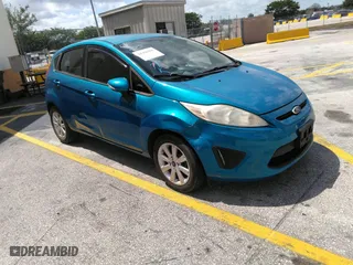 2013 Ford Fiesta SE with VIN 3FADP4EJ0DM202271, listed as a IAAI auction lot 41496985 with 174,624 mi miles. Bid and sale history available at carsss.com. Image 1.