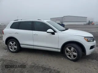 2012 Volkswagen Touareg Sport with VIN WVGEF9BP2CD010668, listed as a Copart auction lot 55306485 with 166,255 mi miles and Clean Title. Bid and sale history available at DreamBid. Image 4.