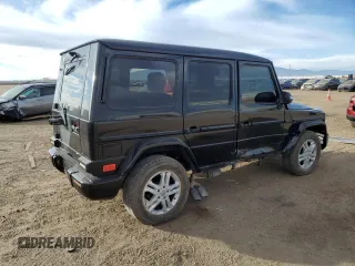 2004 Mercedes-Benz G-Class with VIN WDCYR49E54X143676, listed as a Copart auction lot 41368475 with 90,653 mi miles and Salvage Title. Bid and sale history available at carsss.com. Image 3.