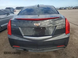 2016 Cadillac ATS Standard RWD z VIN 1G6AA5RA4G0180364, wystawiony jako Copart lot #87977685 z przebiegiem 75 000 mil mil oraz Nie do naprawy • Non repairable. Historia ofert i sprzedaży dostępna na DreamBid. Obrazek 6.
