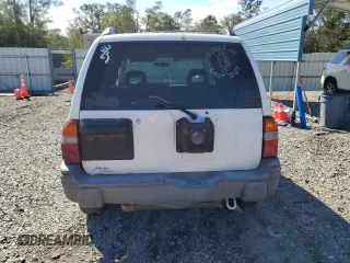 2003 Chevrolet Tracker z VIN 2CNBE13C736912038, wystawiony jako Copart lot #80422844 z przebiegiem 242 512 mil mil oraz Szkoda całkowita • Salvage title. Historia ofert i sprzedaży dostępna na DreamBid. Obrazek 6.