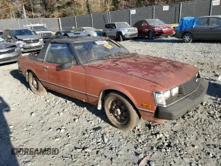 1981 Toyota Celica z VIN JT2RA44C1B0014985, wystawiony jako Copart lot #78658324 z przebiegiem Nie podano mil oraz Czysty tytuł • Clean title. Historia ofert i sprzedaży dostępna na DreamBid. Obrazek 4.