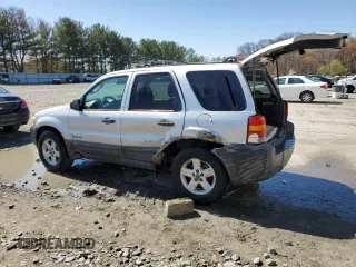 2006 Ford Escape Hybrid with VIN 1FMCU96H06KD03730, listed as a Copart auction lot 52585995 with 189,363 mi miles and Salvage title. Bid and sale history available at DreamBid. Image 2.