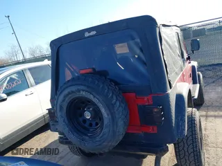 1997 Jeep Wrangler SE z VIN 1J4FY29PXVP476036, wystawiony jako IAAI lot #41882559 z przebiegiem 82 888 mil mil oraz . Historia ofert i sprzedaży dostępna na DreamBid. Obrazek 16.
