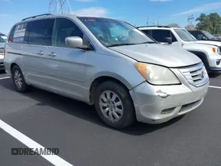 2008 Honda Odyssey EX-L with VIN 5FNRL38718B076647, listed as a IAAI auction lot 41854493 with 168,455 mi miles. Bid and sale history available at carsss.com. Image 1.