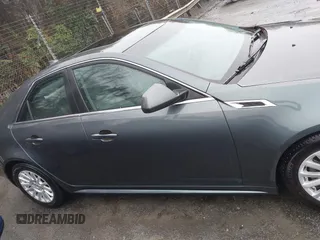 2012 Cadillac CTS with VIN 1G6DA5E56C0143588, listed as a IAAI auction lot 41416131 with 230,310 mi miles and . Bid and sale history available at DreamBid. Image 13.