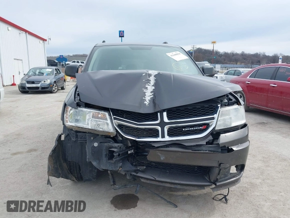 2017 Dodge Journey SE with VIN 3C4PDCABXHT694909, listed as a IAAI auction lot 41640828 with 188,657 mi miles and . Bid and sale history available at DreamBid. Image 6.