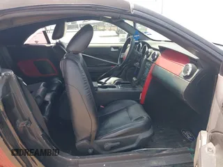 2005 Ford Mustang Deluxe z VIN 1ZVFT84N055190900, wystawiony jako IAAI lot #42373274 z przebiegiem 174 840 mil mil oraz . Historia ofert i sprzedaży dostępna na DreamBid. Obrazek 5.
