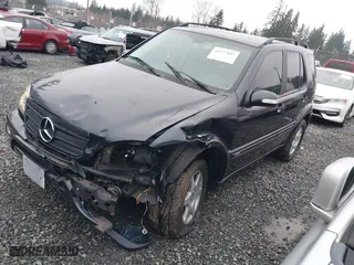 2002 Mercedes-Benz M-Class with VIN 4JGAB54E72A296354, listed as a IAAI auction lot 41277897 with 101,842 mi miles. Bid and sale history available at carsss.com. Image 17.