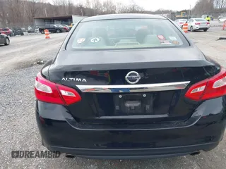 2016 Nissan Altima SV with VIN 1N4AL3AP0GC225851, listed as a IAAI auction lot 41662946 with 119,033 mi miles and . Bid and sale history available at DreamBid. Image 16.