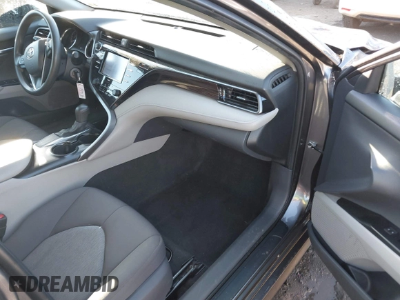 2020 Toyota Camry LE with VIN 4T1C11AKXLU884764, listed as a IAAI auction lot 40821088 with 111,631 mi miles. Bid and sale history available at carsss.com. Image 5.