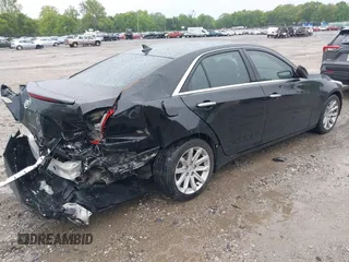 2014 Cadillac CTS AWD z VIN 1G6AW5SX4E0129136, wystawiony jako IAAI lot #42364098 z przebiegiem 137 080 mil mil oraz . Historia ofert i sprzedaży dostępna na DreamBid. Obrazek 4.