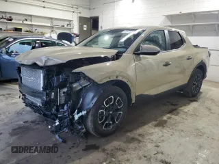 2024 Hyundai Santa Cruz SEL z VIN 5NTJBDAEXRH099329, wystawiony jako Copart lot #61415105 z przebiegiem 5 415 mil mil oraz Szkoda całkowita • Salvage title. Historia ofert i sprzedaży dostępna na DreamBid. Obrazek 1.