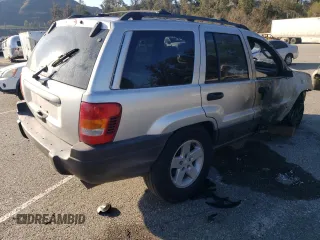 2003 Jeep Grand Cherokee Laredo with VIN 1J4GX48S63C523513, listed as a Copart auction lot 50001005 with 0 mi miles and Salvage Title. Bid and sale history available at carsss.com. Image 3.