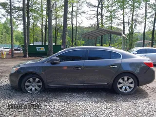 2012 Buick LaCrosse Premium 3 z VIN 1G4GH5E31CF310937, wystawiony jako IAAI lot #42092530 z przebiegiem 165 295 mil mil oraz . Historia ofert i sprzedaży dostępna na DreamBid. Obrazek 14.