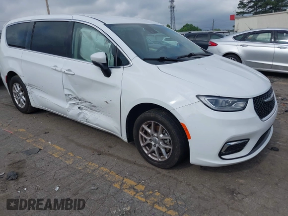 2023 Chrysler Pacifica Touring L with VIN 2C4RC1BG8PR535446, listed as a IAAI auction lot 42307923 with 65,718 mi miles and . Bid and sale history available at DreamBid. Image 6.