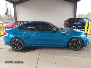2018 BMW M2 z VIN WBS1J5C59JVA12718, wystawiony jako IAAI lot #41796602 z przebiegiem 53 707 mil mil oraz . Historia ofert i sprzedaży dostępna na DreamBid. Obrazek 14.