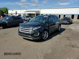 2015 Ford Edge Titanium z VIN 2FMTK4K86FBB88124, wystawiony jako Copart lot #57392305 z przebiegiem 95 698 mil mil oraz Szkoda całkowita • Salvage title. Historia ofert i sprzedaży dostępna na DreamBid. Obrazek 13.