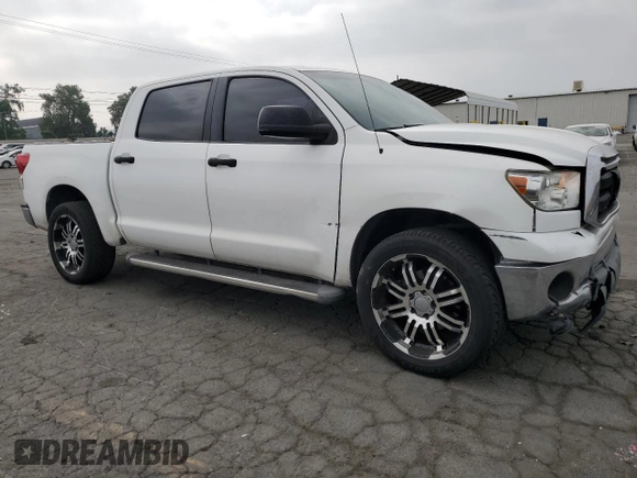 2011 Toyota Tundra with VIN 5TFEM5F19BX023519, listed as a Copart auction lot 58642205 with 157,480 mi miles and Salvage title. Bid and sale history available at DreamBid. Image 4.