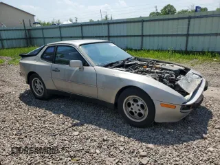 1984 Porsche 944 z VIN WP0AA0944EN453698, wystawiony jako Copart lot #59757475 z przebiegiem 17 718 mil mil oraz Szkoda całkowita • Salvage title. Historia ofert i sprzedaży dostępna na DreamBid. Obrazek 4.