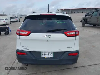 2016 Jeep Cherokee Latitude with VIN 1C4PJMCB1GW340605, listed as a IAAI auction lot 41523716 with 74,080 mi miles. Bid and sale history available at carsss.com. Image 16.