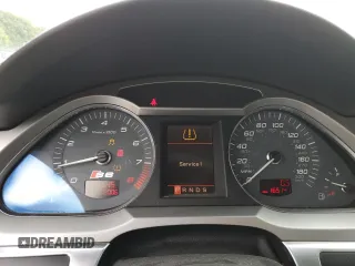 2007 Audi S6 z VIN WAUGN94F97N122482, wystawiony jako Copart lot #70519044 z przebiegiem 165 141 mil mil oraz Szkody całkowita. Historia ofert i sprzedaży dostępna na DreamBid. Obrazek 9.