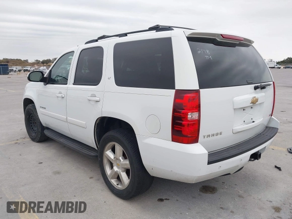 2007 Chevrolet Tahoe LTZ with VIN 1GNFC13027J402178, listed as a IAAI auction lot 41605898 with 203,677 mi miles and . Bid and sale history available at DreamBid. Image 3.