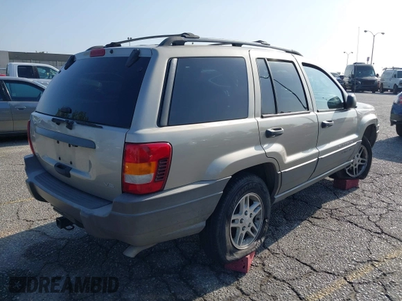 2004 Jeep Grand Cherokee Laredo with VIN 1J4GX48N24C334983, listed as a IAAI auction lot 42522088 with 169,793 mi miles and . Bid and sale history available at DreamBid. Image 4.