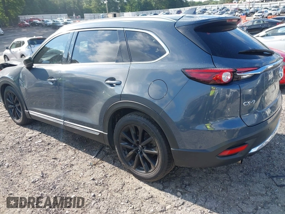 2021 Mazda CX-9 Grand Touring with VIN JM3TCADY7M0528223, listed as a IAAI auction lot 42395861 with 57,767 mi miles and . Bid and sale history available at DreamBid. Image 3.