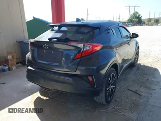 2021 Toyota C-HR LE with VIN NMTKHMBX4MR120064, listed as a IAAI auction lot 41912166 with 61,402 mi miles and . Bid and sale history available at DreamBid. Image 4.