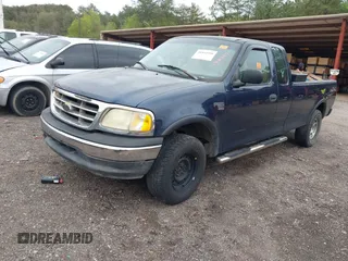 2003 Ford F-150 XL with VIN 1FTRX18L63NB59927, listed as a IAAI auction lot 41842559 with 1 mi miles. Bid and sale history available at carsss.com. Image 2.