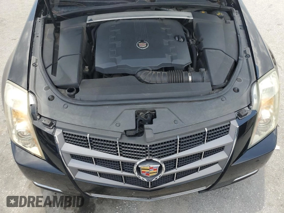 2010 Cadillac CTS Premium z VIN 1G6DP5EV2A0144524, wystawiony jako Copart lot #58913445 z przebiegiem 218 130 mil mil oraz Szkoda całkowita • Salvage title. Historia ofert i sprzedaży dostępna na DreamBid. Obrazek 11.