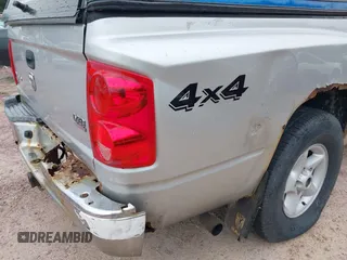 2005 Dodge Dakota SLT with VIN 1D7HW48N65S199887, listed as a IAAI auction lot 42508977 with 192,330 mi miles and . Bid and sale history available at DreamBid. Image 6.