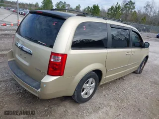 2010 Dodge Grand Caravan SXT with VIN 2D4RN5DX5AR290131, listed as a IAAI auction lot 41314452 with 194,819 mi miles. Bid and sale history available at carsss.com. Image 4.
