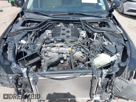 2014 Infiniti Q50 Premium z VIN JN1BV7AP2EM673289, wystawiony jako IAAI lot #42552398 z przebiegiem 172 770 mil mil oraz . Historia ofert i sprzedaży dostępna na DreamBid. Obrazek 10.