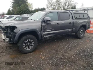 2017 Toyota Tacoma SR5 with VIN 3TMDZ5BN0HM021436, listed as a Copart auction lot 51812125 with 123,812 mi miles and Salvage Title. Bid and sale history available at carsss.com. Image 1.