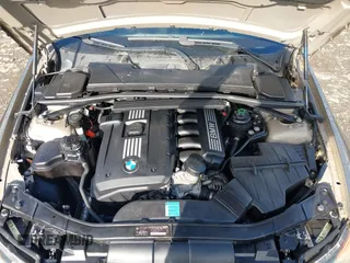 2007 BMW 3 Series 328xi with VIN WBAVC93577KX57207, listed as a IAAI auction lot 42024089 with 119,521 mi miles. Bid and sale history available at carsss.com. Image 10.