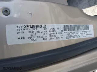 2012 Dodge Grand Caravan SE with VIN 2C4RDGBG3CR385529, listed as a IAAI auction lot 41506810 with 153,300 mi miles. Bid and sale history available at carsss.com. Image 9.
