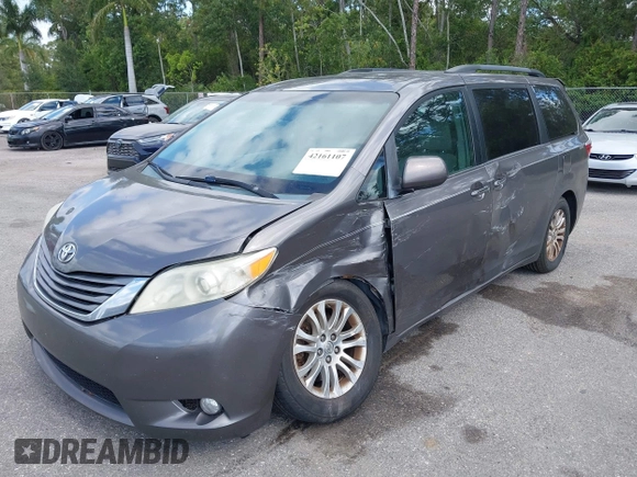 2015 Toyota Sienna XLE with VIN 5TDYK3DC3FS556859, listed as a IAAI auction lot 42161107 with 200,502 mi miles and . Bid and sale history available at DreamBid. Image 6.